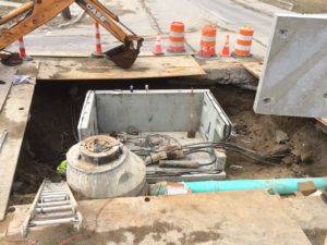 6-piece panel manhole around existing lines