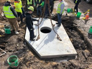 Precast concrete roof slab on existing manhole